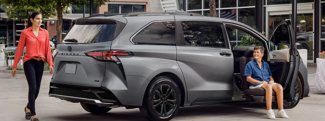 A family around a 2026 Toyota Sienna 